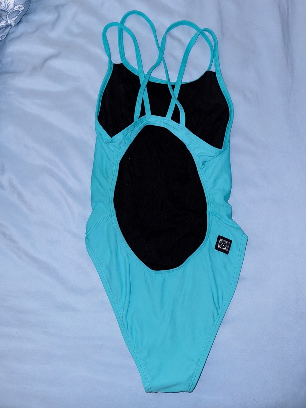 Jolyn Clothing training suit in the color Hawaii blue